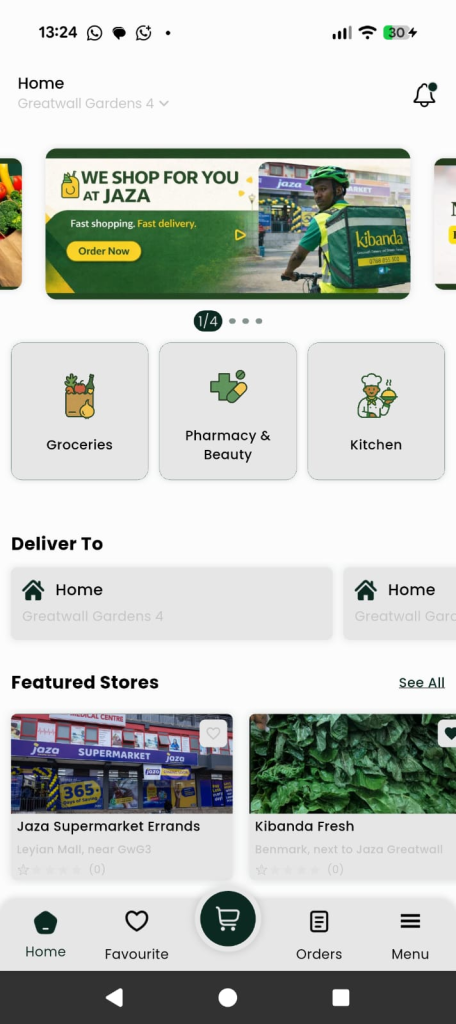 Kibanda app home screen showing grocery, pharmacy, and kitchen categories, delivery location set to Greatwall Gardens, and featured stores including Jaza Supermarket.